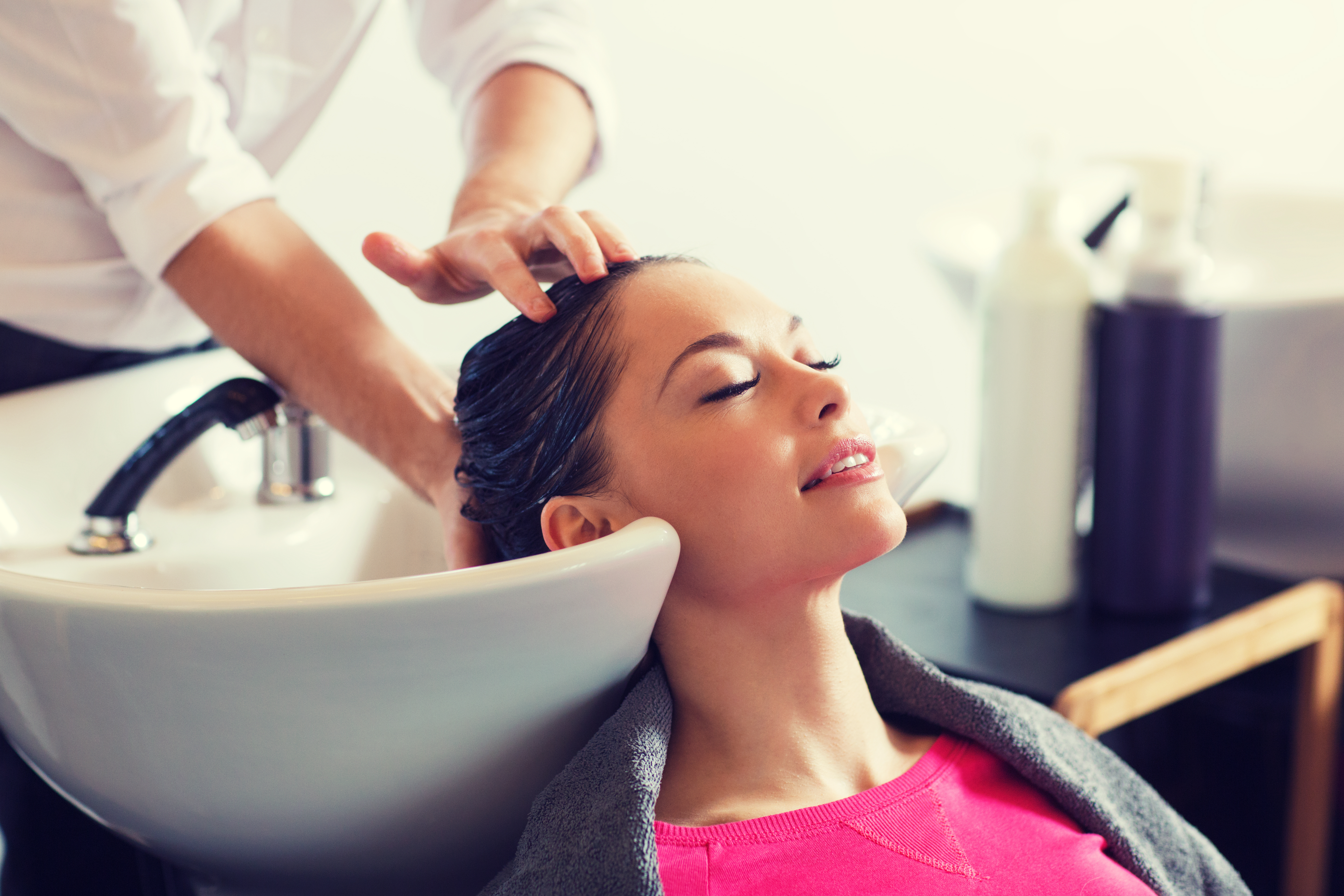 Washing hair in a beauty salon Washing hair in a beauty salon